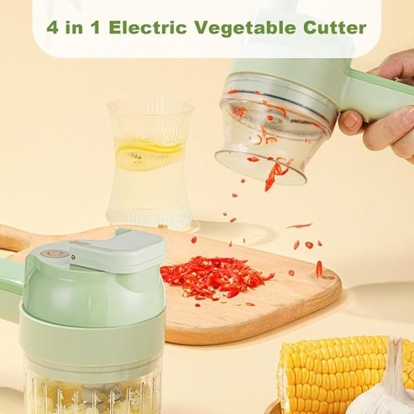 Electric vegetable cutter emptying freshly chopped vegetables and with an anti-splash cup preventing vegetable huice from splashing