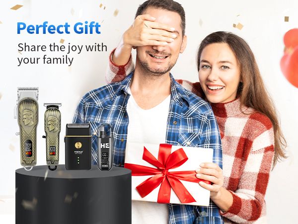 A smiling woman surprising a man with a red ribbon gift box beside a display of hair clipper and trimmer sets