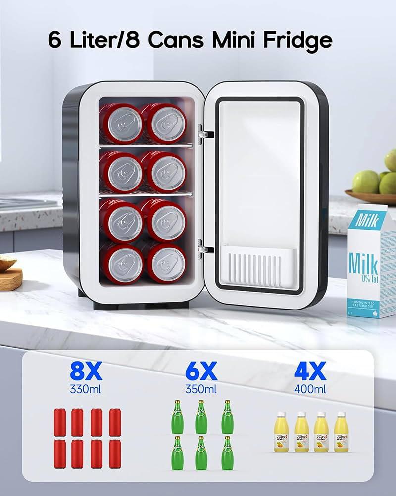 Black and white 6 liter mini fridge with door open showing 8 canned drinks on two shelves, next to a milk carton, on a kitchen countertop